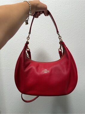 NEW, NEVER USED Coach Pebble Leather Harley East West Hobo in True Red, F38250.